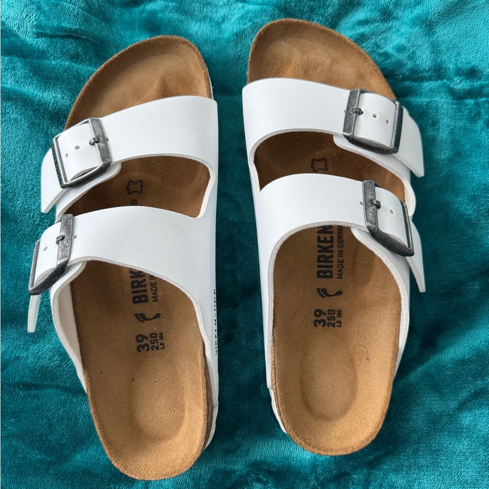 Birkenstock White Sandals with Silver Buckles